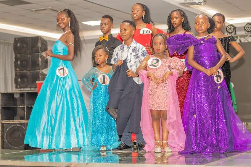 Mr & Miss pageant contestants lined up on stage