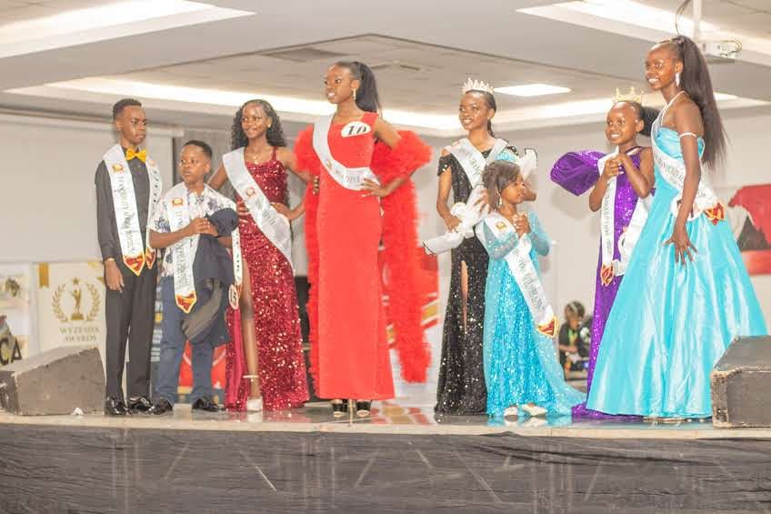 The crowned winners and finalists on stage