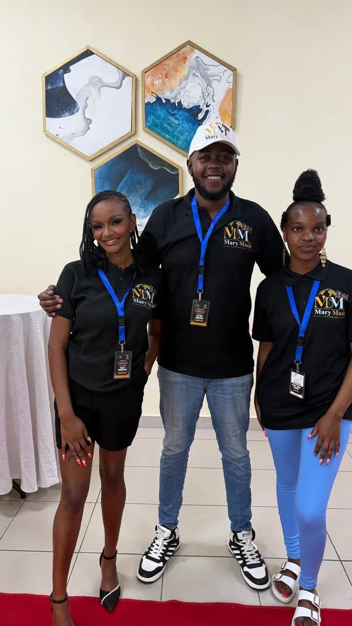 Three Mary Mash team members in branded polos at the venue