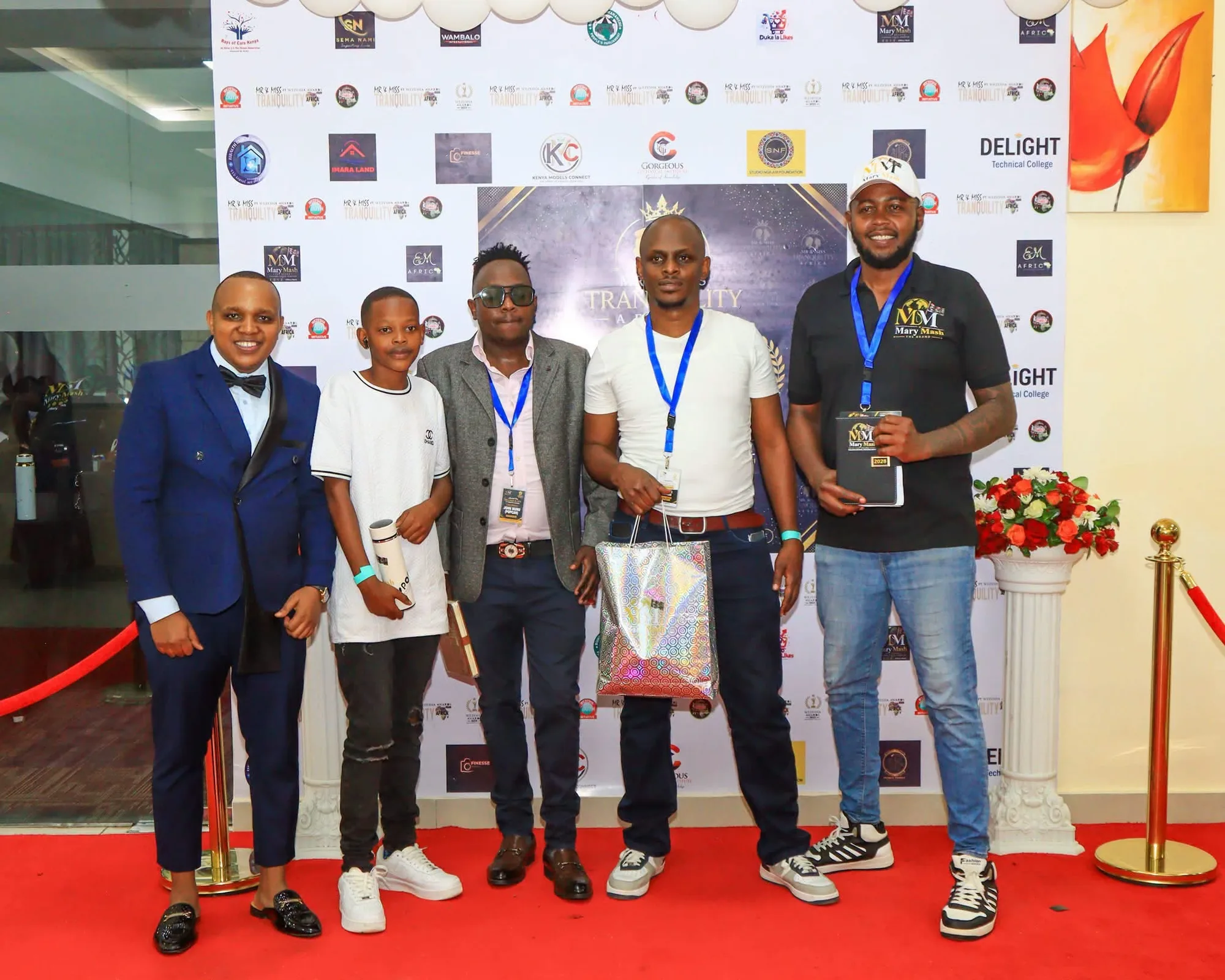 Guests lined up on the red carpet holding Mary Mash 2026 journals