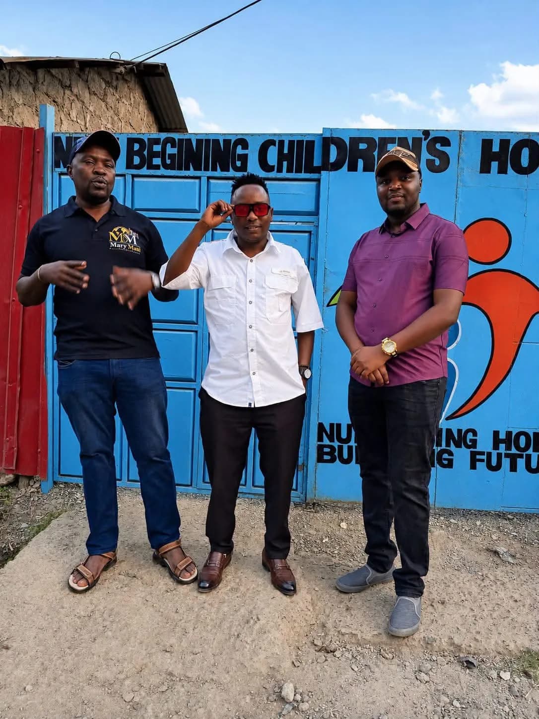 Mary Mash team members outside the gate of New Beginning Children's Home in Utawala